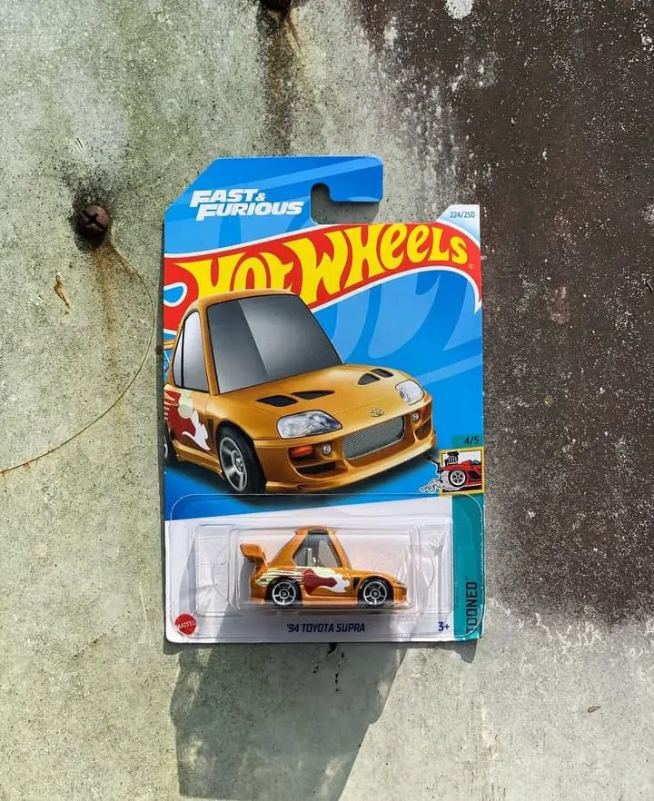 Hot Wheels 94 Toyota Supra Toy Car (Orange)
