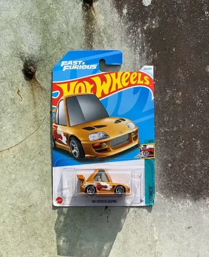 Hot Wheels 94 Toyota Supra Toy Car (Orange)